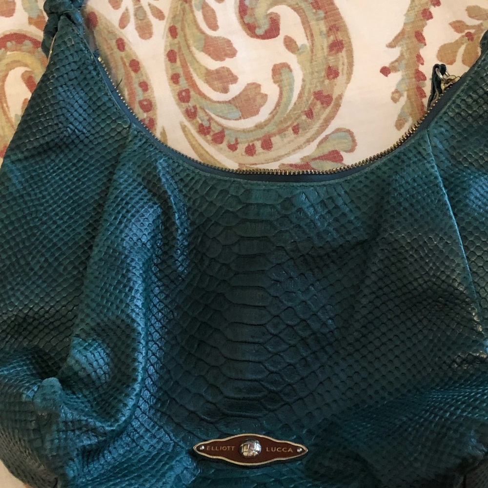 Elliott Lucca Teal leather hobo bag.